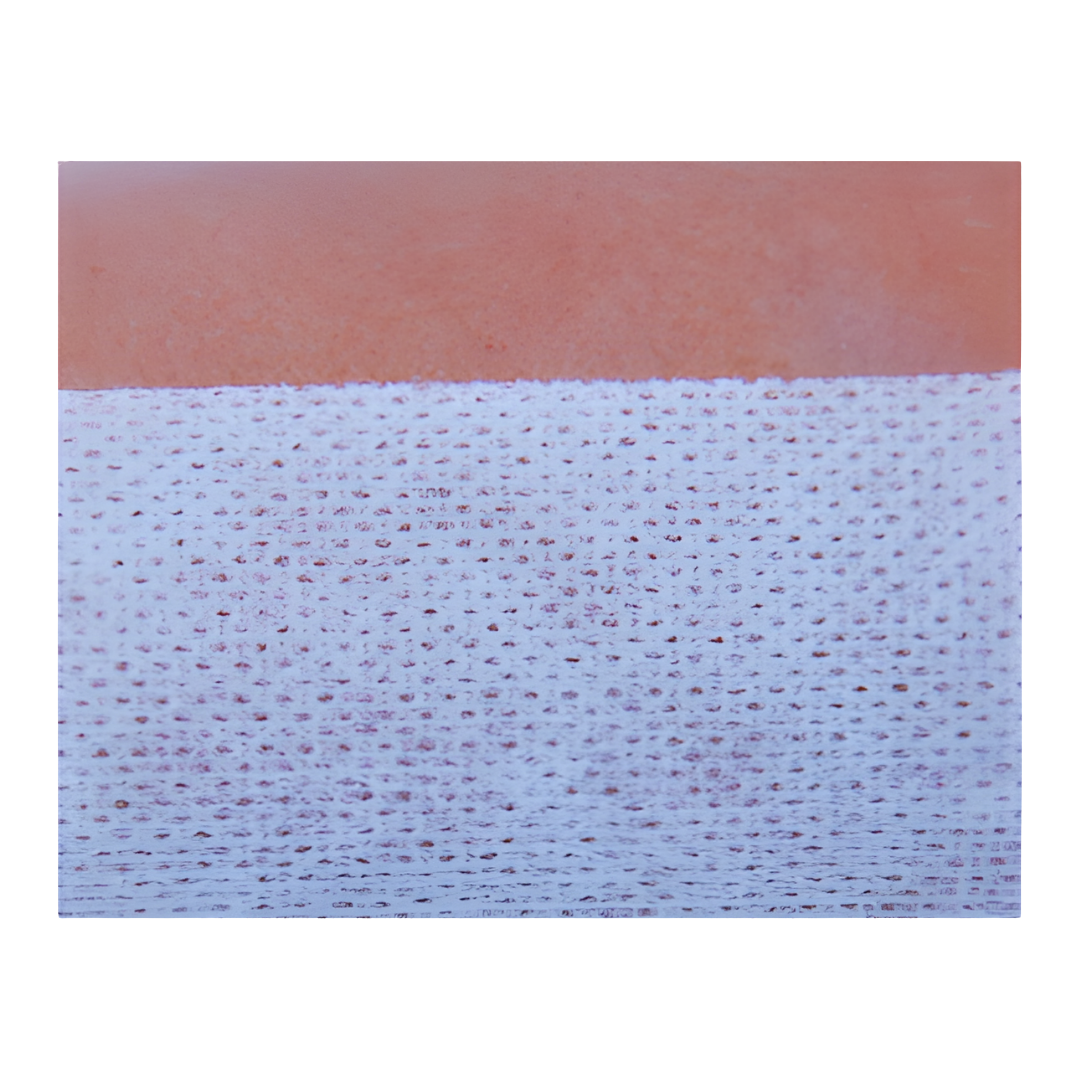 Asguard Flex + Non-Woven Island Dressing featuring a soft, breathable backing with an absorbent non-adherent island pad for gentle wound protection. Designed to conform to body contours while providing secure adhesion and comfortable wear.