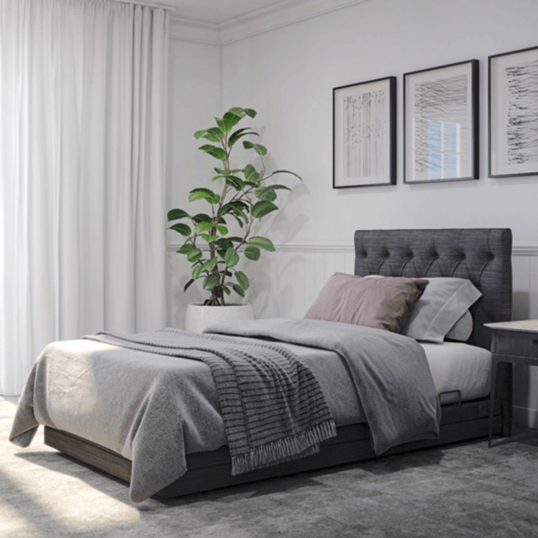 Aspire ComfiMotion Activ Care Ultra Low Bed in upholstered Portobello Grey with adjustable height and head support.