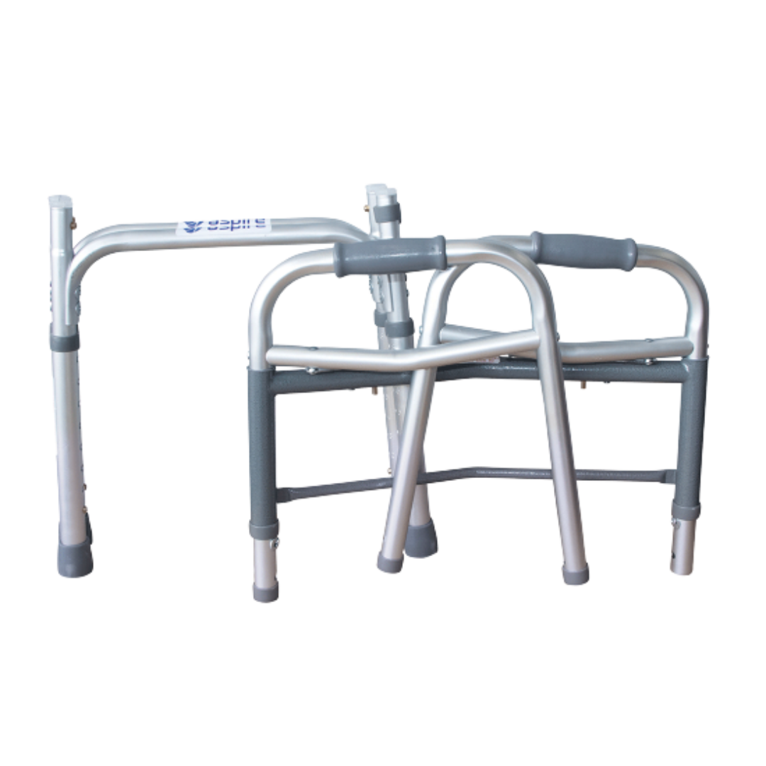 Aspire Side Folding Aluminum Frame in silver finish, shown folded and upright, featuring ergonomic hand grips and non-slip rubber tips for safe, portable mobility.