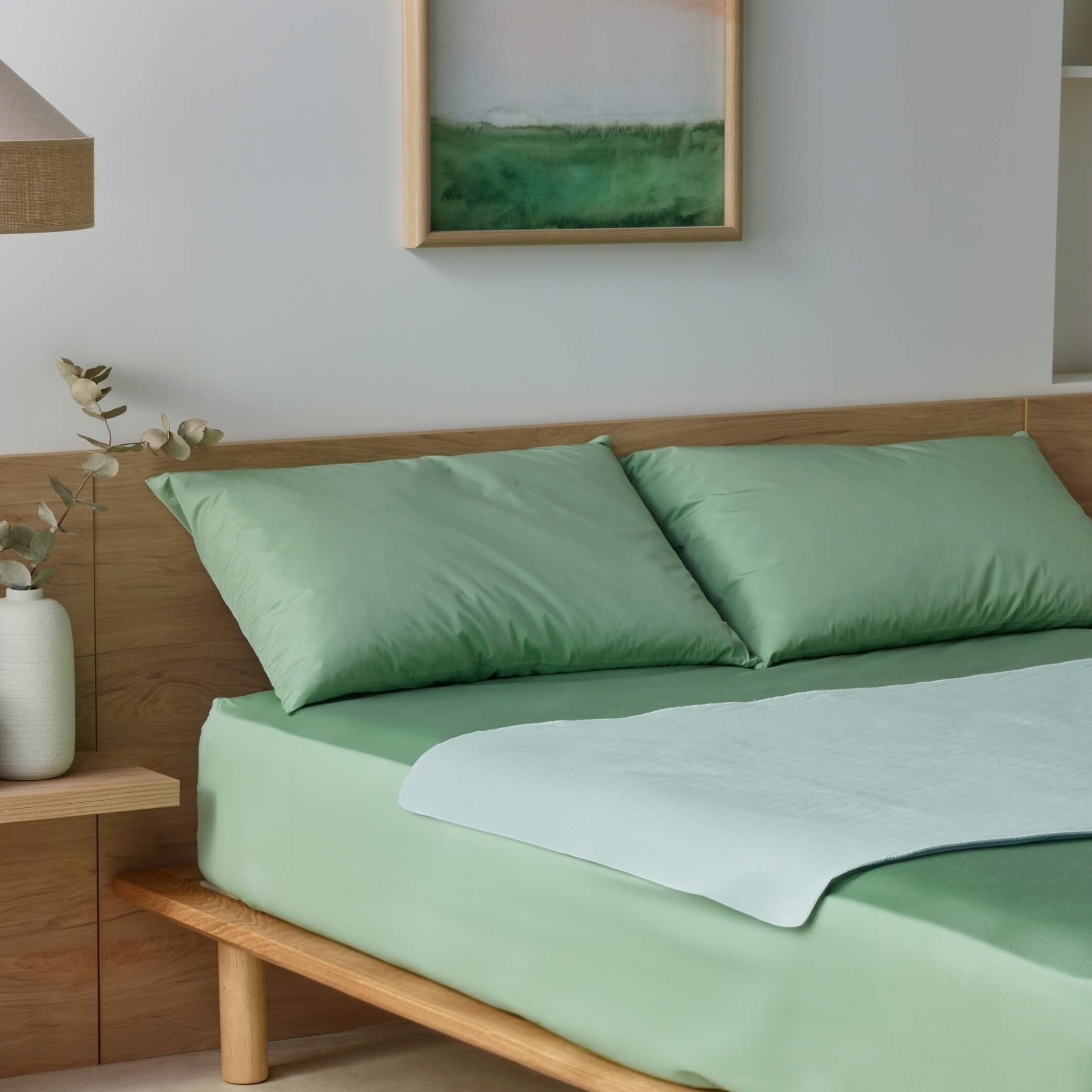 Waterproof bed pad in sage green from Staydry, no wings.