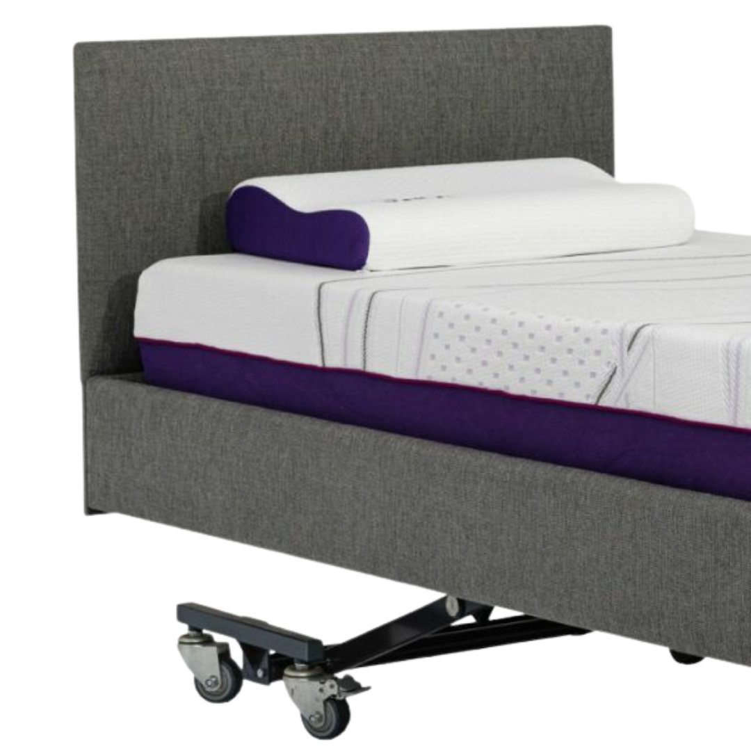 Icare Headboard mounted on an adjustable bed, featuring soft upholstery and pillow retention support for enhanced comfort and bedroom style.
