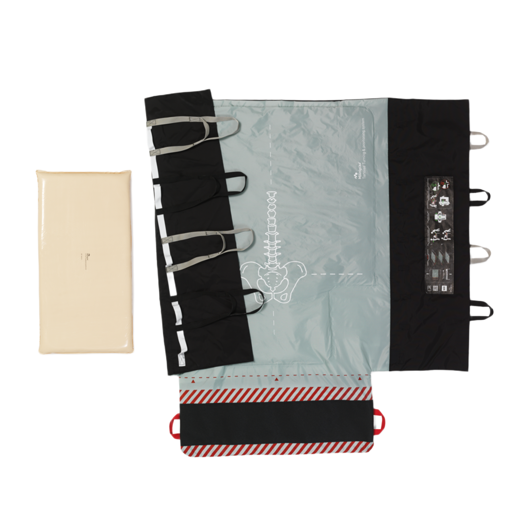 A flat lay view of the Mölnlycke Tortoise Turning and Positioning System, showing the light blue positioning mat with spinal alignment graphics, black reinforced handles, and a cream-colored foam pressure-redistribution pad.