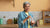 elderly woman drinking fortisip from a glass
