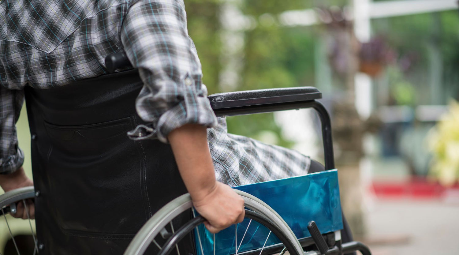 mobility equipment maintenance - person on a wheelchair