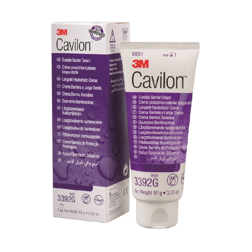The retail box and 92g tube of 3M Cavilon Durable Barrier Cream (REF 3392G), showing the purple and white branding used for professional skin protection.