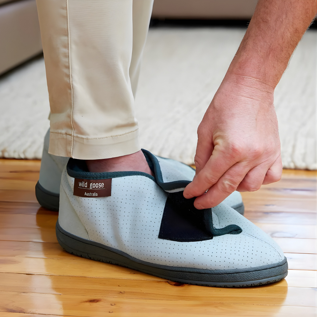 ADL Sheepskin Medical Wild Goose Boot Wrap Around pair in multiple sizes, offering soft cushioning and pressure relief for feet and lower legs during extended rest.