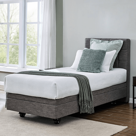 Aspire ComfiMotion Care Bed in King Single size, styled in a modern bedroom setting for comfort and elegant home care.
