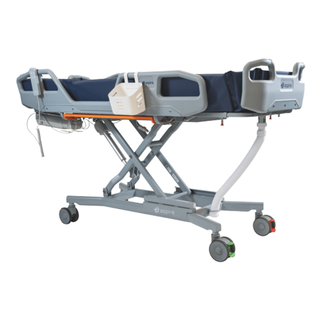 Aspire Electric Shower Trolley with padded surface and adjustable height, designed for supported bathing in hospitals and aged care.
