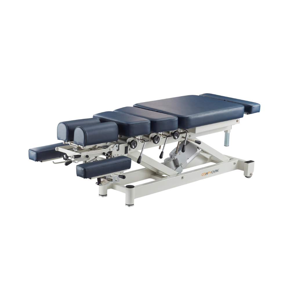 A navy blue chiropractic table with an adjustable headrest and footrest, featuring a stainless steel frame and a manual drop mechanism.