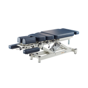 A navy blue chiropractic table with an adjustable headrest and footrest, featuring a stainless steel frame and a manual drop mechanism.