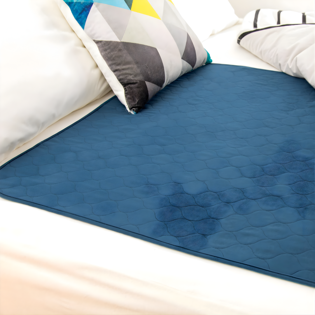 Conni Bed Pad Teal Blue Standard variant, reusable washable continence aid offering bedding protection with soft absorbent teal fabric.