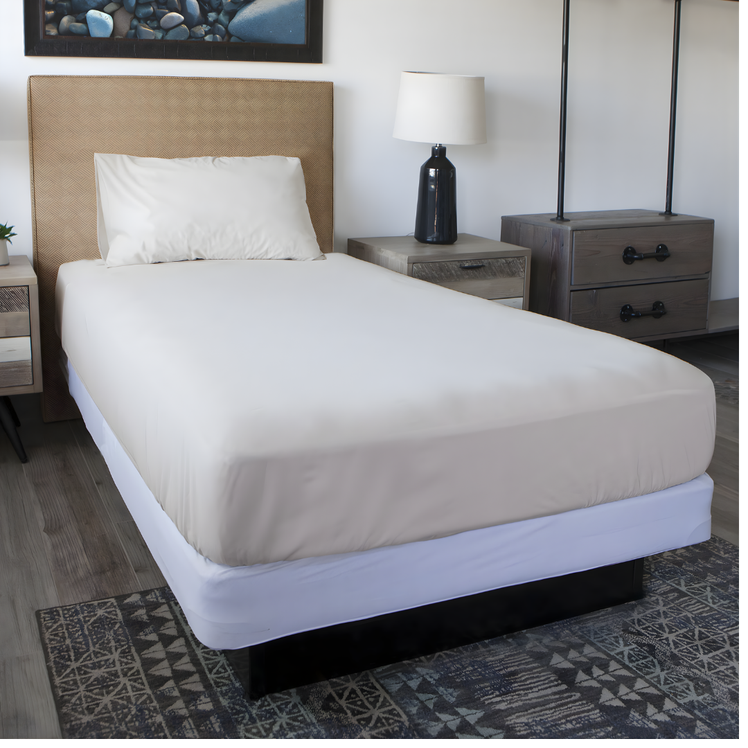 Conni Mattress Protector in Single, Double, King Single, Queen and King sizes offers discreet, washable waterproof bedding protection for comfort and dignity.