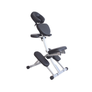 Deluxe Portable Massage Chair in black with adjustable headrest and arm support, folded flat with carry bag