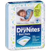Huggies DryNites Bed Mats with soft surface and adhesive strips, designed for overnight bedwetting protection on mattresses and bedding for children.