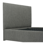 Icare Headboard mounted on an adjustable bed, featuring soft upholstery and pillow retention support for enhanced comfort and bedroom style.