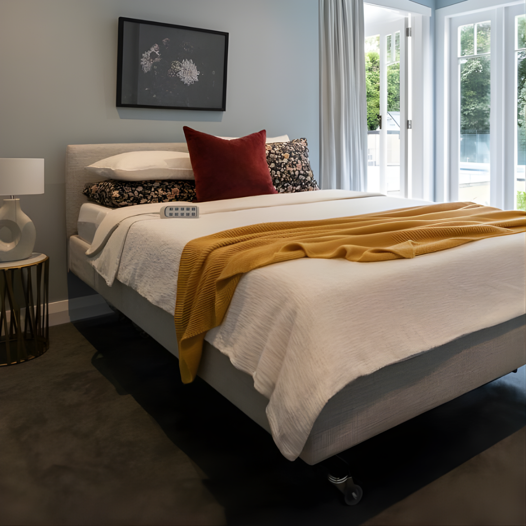 Icare IC333 Homecare Bed shown with adjustable backrest and leg rest, featuring upholstered finish and ultra-low height for safe mobility.