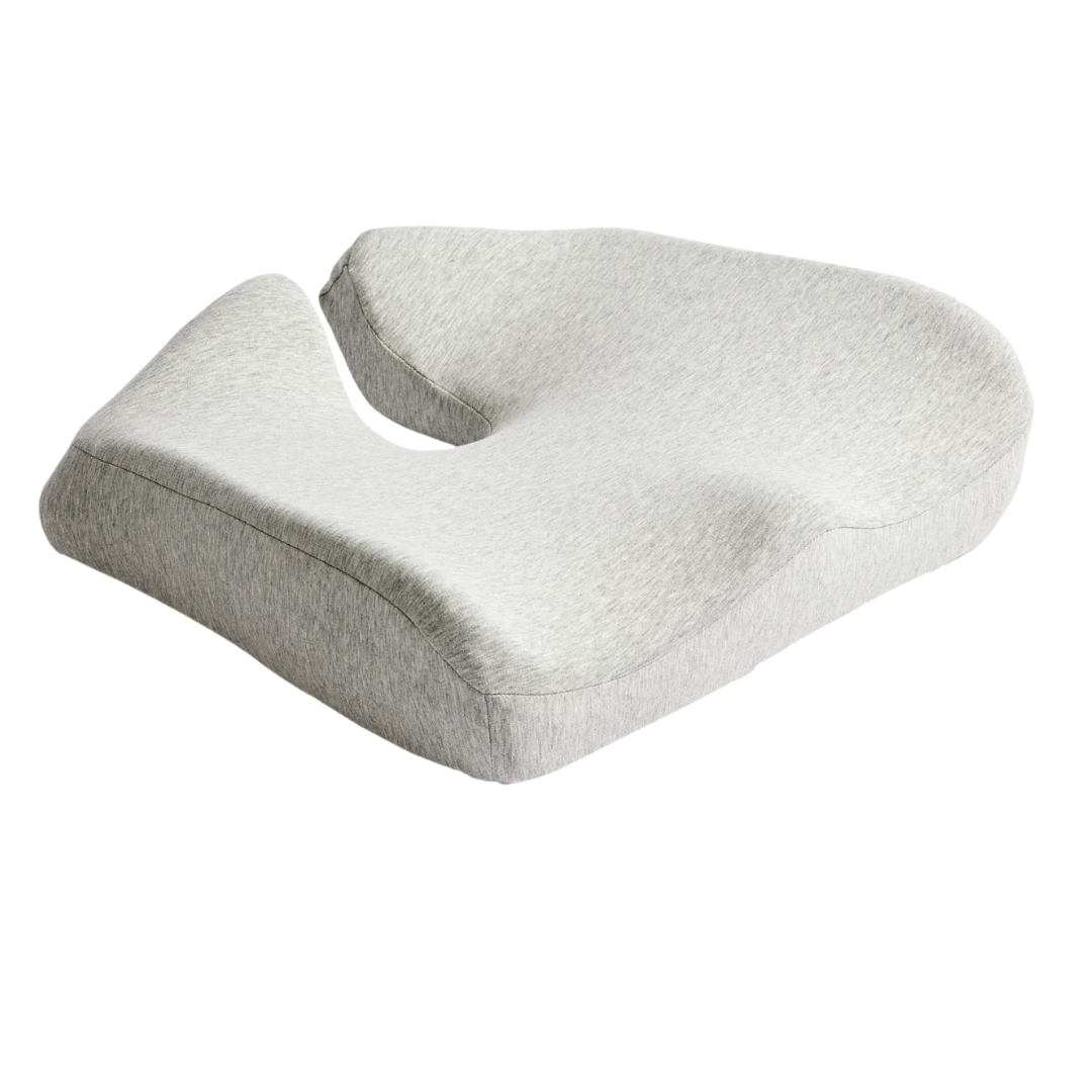 Icare Reform Seat Support cushion with charcoal‑infused ActiveX foam, ergonomic moulded zones, coccyx cutout, and anti‑slip base for pressure relief and comfort.