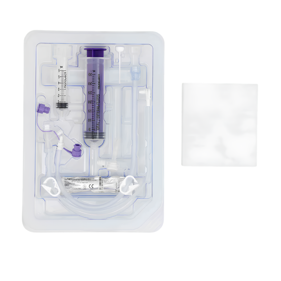 Mic-Key G 18 French low-profile balloon gastrostomy feeding tube with ENFit extension set, showing a flat button-style external port connected to a flexible extension tubing with ENFit connector.