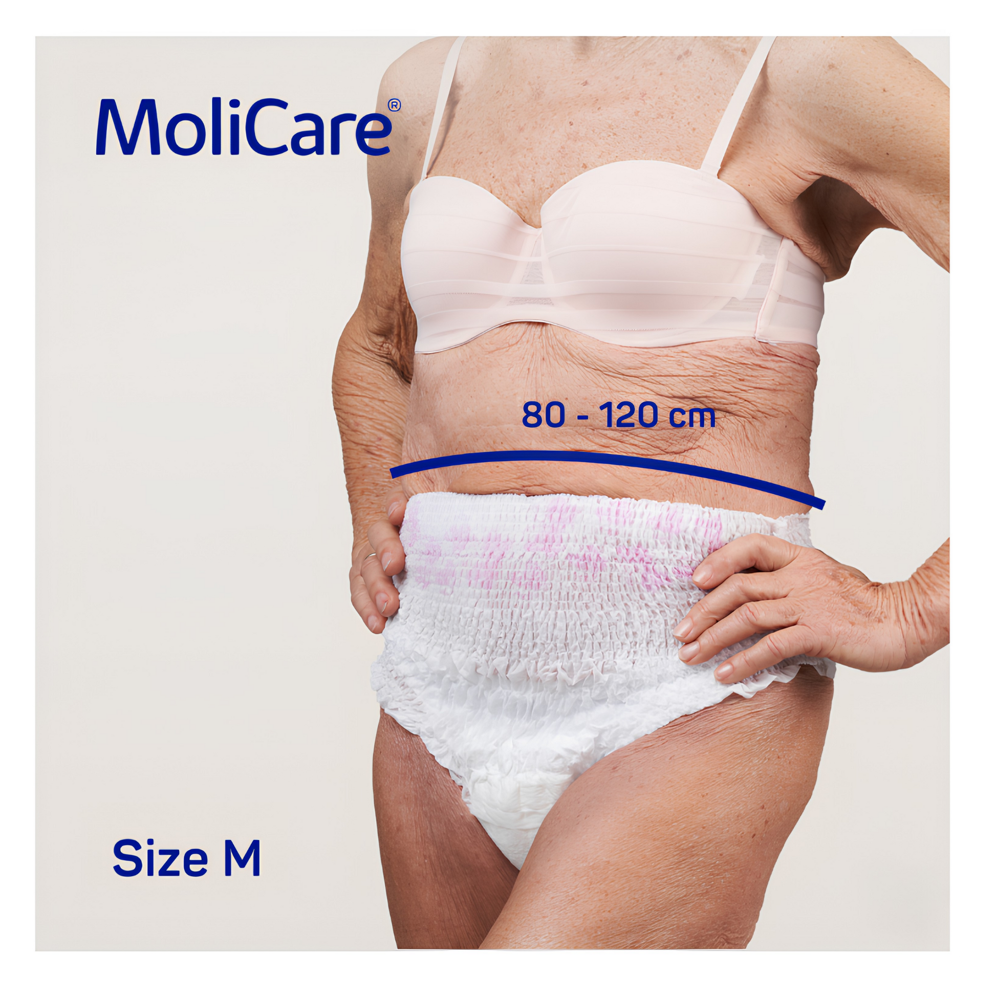 Older woman wearing white disposable incontinence pants and a bra, demonstrating waist fit (80–120 cm), labeled MoliCare Size M.