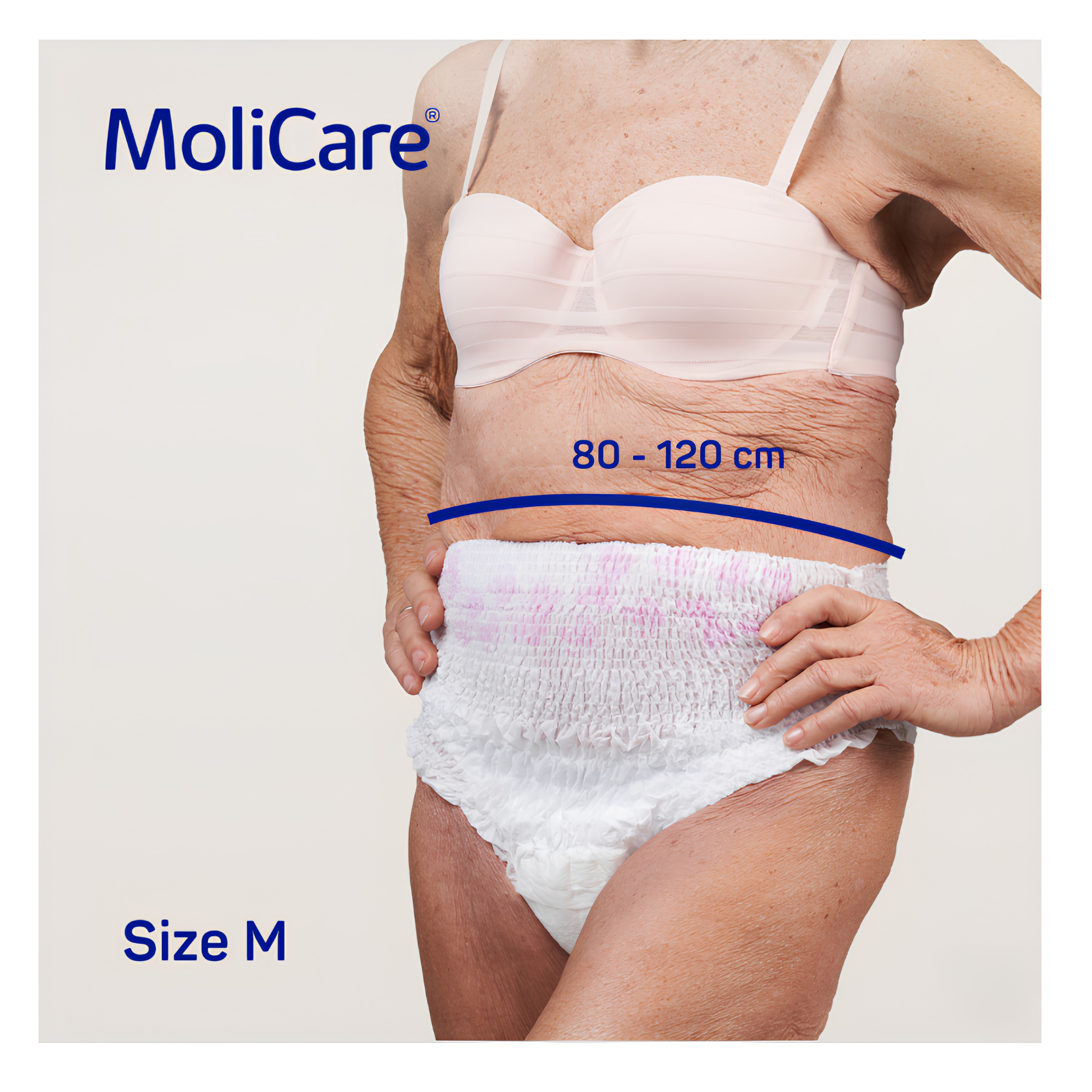 Older woman wearing white disposable incontinence pants and a bra, demonstrating waist fit (80–120 cm), labeled MoliCare Size M.