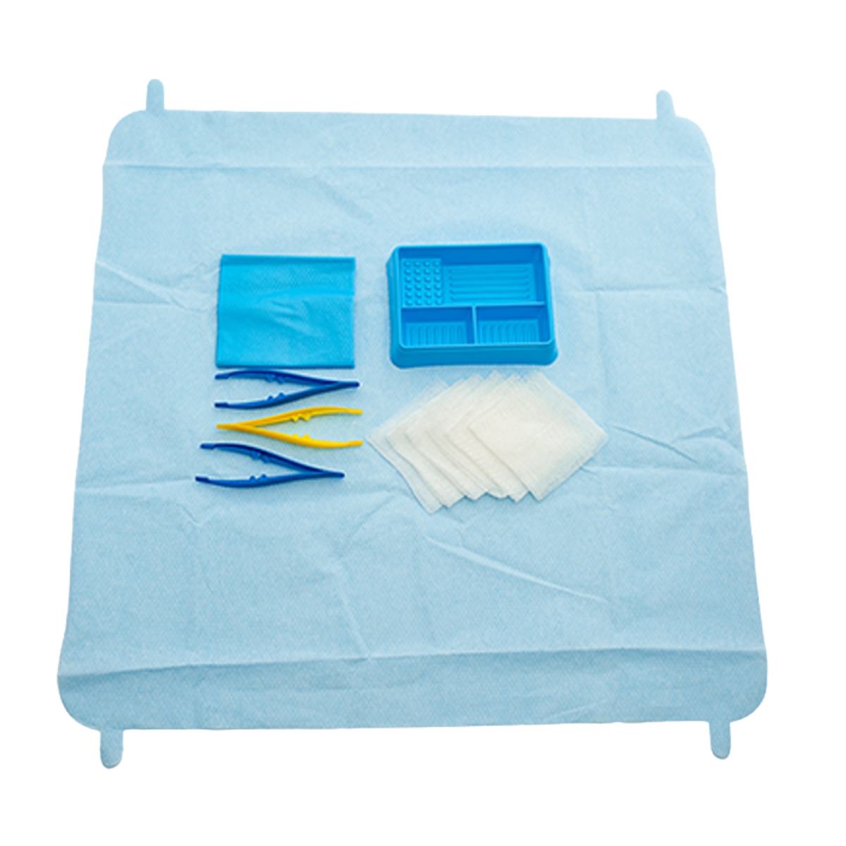 Unpacked Multigate Basic Dressing Pack laid out on an open light blue sterile drape, featuring a blue compartment tray, folded blue sterile field, blue and yellow plastic forceps, and a stack of white non-woven swabs on a transparent background.