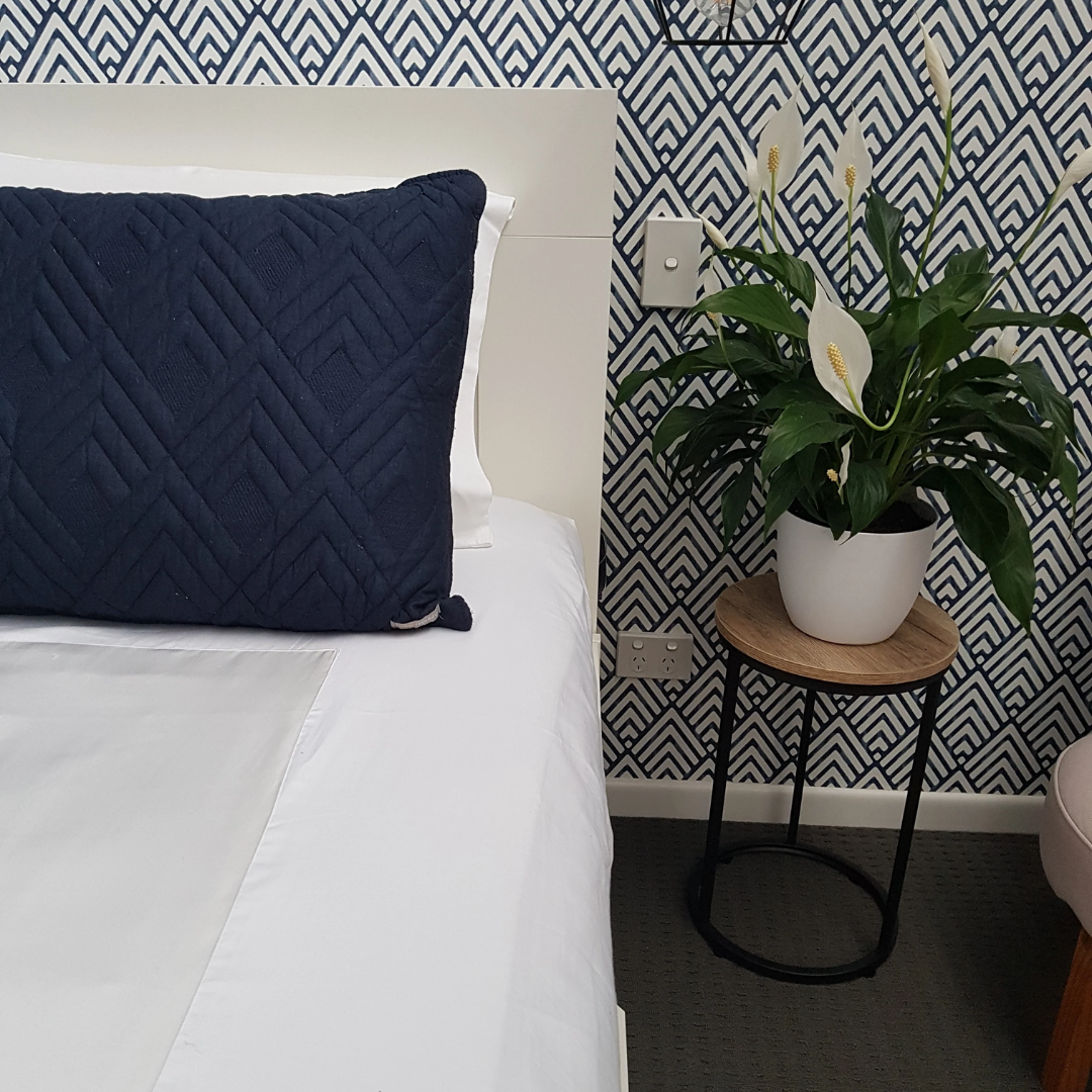 Neeki Designs Wonder Sheet Plus Fitted Sheet with satin centre panel for mobility and comfort.