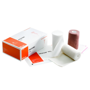 A variety of rolled bandages in different colors stacked on top of each other, typically used for medical or surgical purposes.