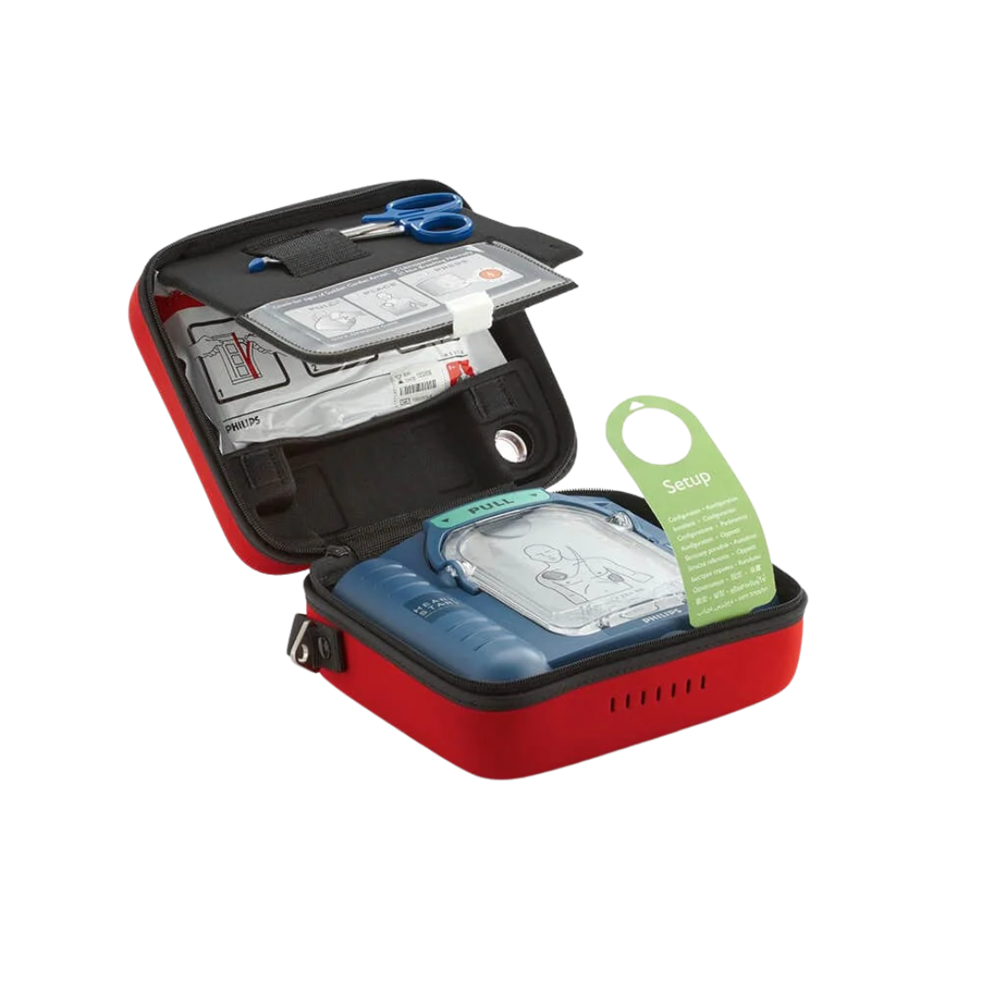 Philips HeartStart HS1 Defibrillator – easy-to-use AED with wall mount and 3D reflective sign for fast cardiac emergency response.