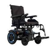 Quickie Q100 ultra-compact power wheelchair with smart base, foldable backrest, and adjustable comfort seating for indoor and outdoor mobility.