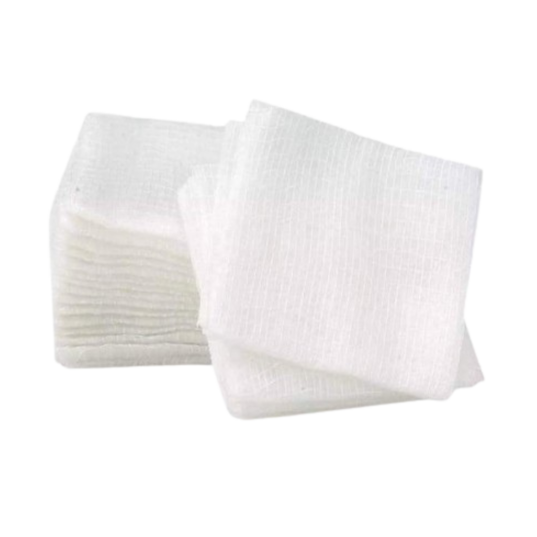 Close-up shot of a stack of folded white gauze swabs, highlighting the texture and 8-ply material.