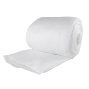 A large, tightly rolled white non-woven combine dressing or padding, unspooling slightly against a black background.