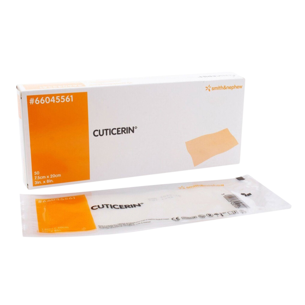 A box and individual sachet of Cuticerin non-aqueous ointment dressings, size 7.5cm x 7.5cm (3in x 3in).
