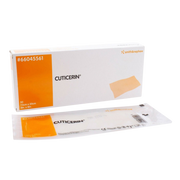 A box and individual sachet of Cuticerin non-aqueous ointment dressings, size 7.5cm x 7.5cm (3in x 3in).
