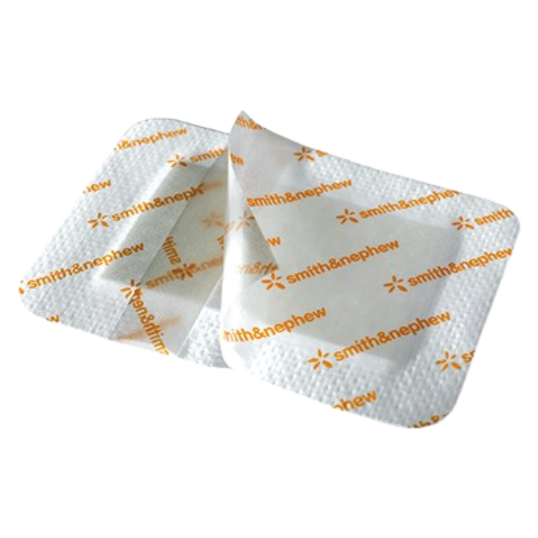 Two triangular medical pads with 'Smith & Nephew' branding on a white background
