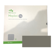 A 20 by 50 cm box of Mepilex Ag dressing shown next to a large, rectangular grey antimicrobial foam dressing pad.