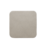 Close-up of a single beige square Mölnlycke Mepilex Border Ag foam dressing pad.