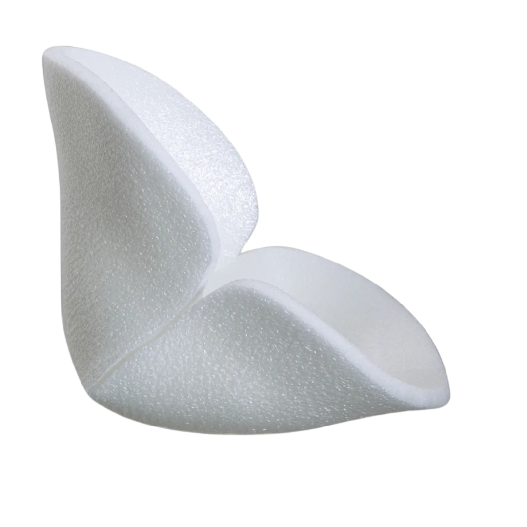 Side view of the thick, uniquely folded Mepilex Heel foam dressing, designed to comfortably cup the heel area.