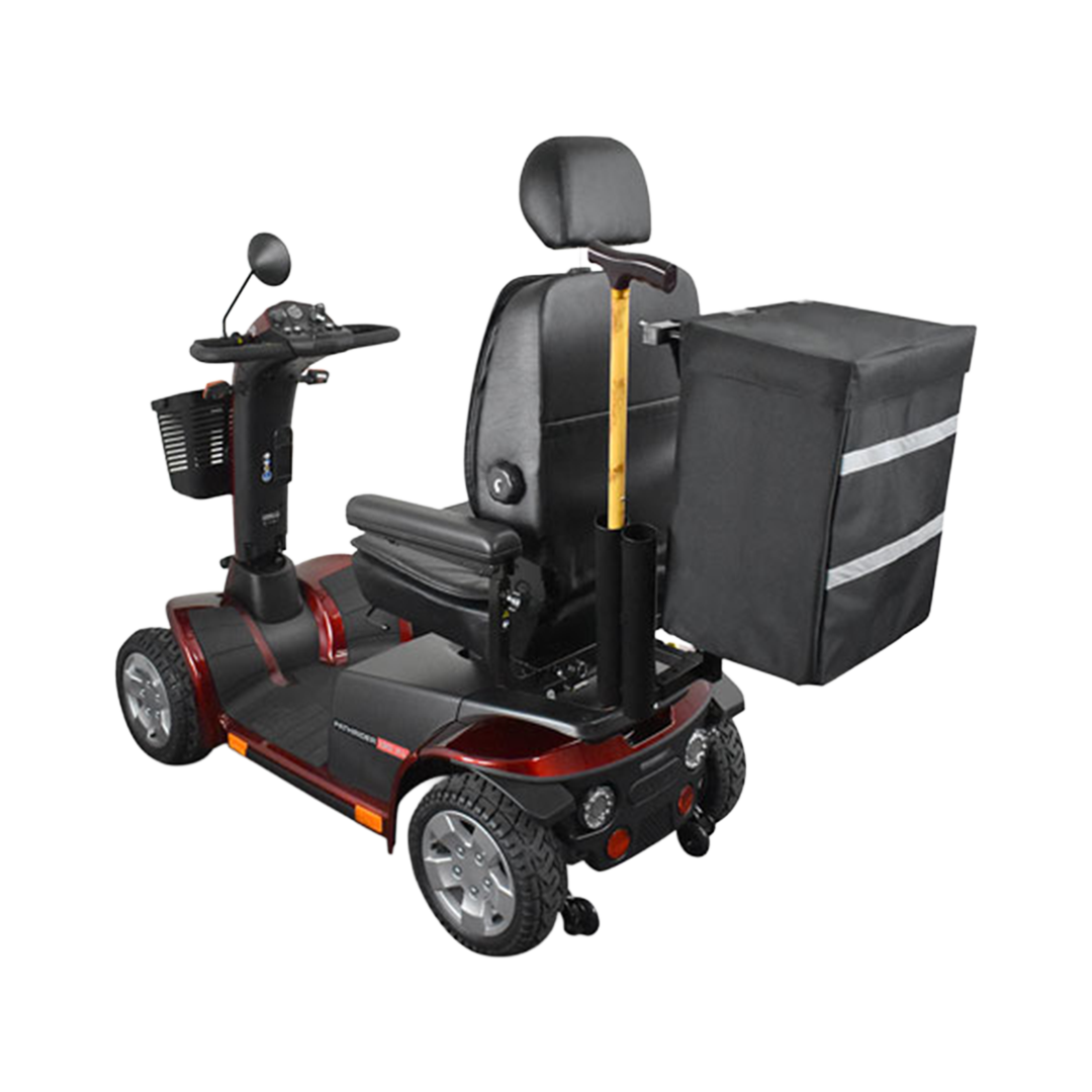 Black and red mobility scooter with a bag on a white background