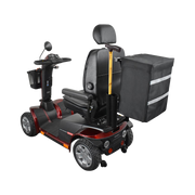 Black and red mobility scooter with a bag on a white background