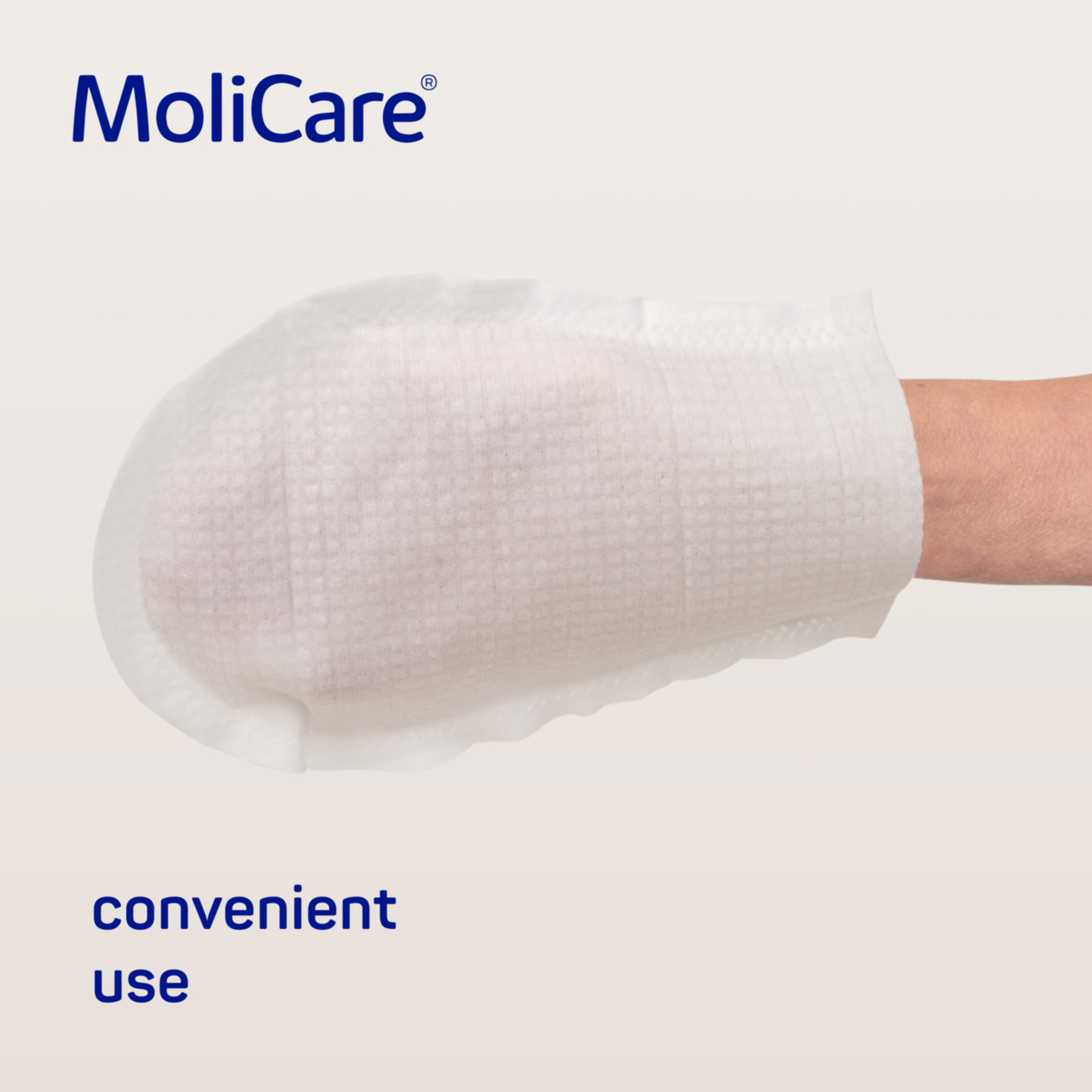 A person wearing a white MoliCare impregnated wash glove on their hand, demonstrating its convenient textured surface for skin cleansing.