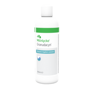 A white Mölnycke Granudacyn Wound Irrigation Solution 500ml bottle with a green and white label.