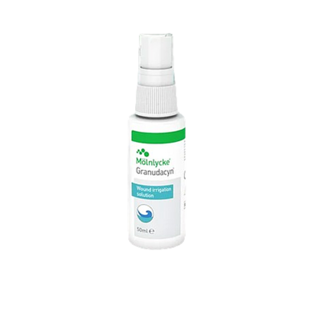 A small white Mölnycke Granudacyn Wound Irrigation Solution 50ml spray bottle with a green and white label.