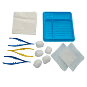 A close-up of the Multigate Basic Dressing Pack contents: blue dressing tray, three pairs of forceps, cotton balls, gauze swabs, and a disposable towel.