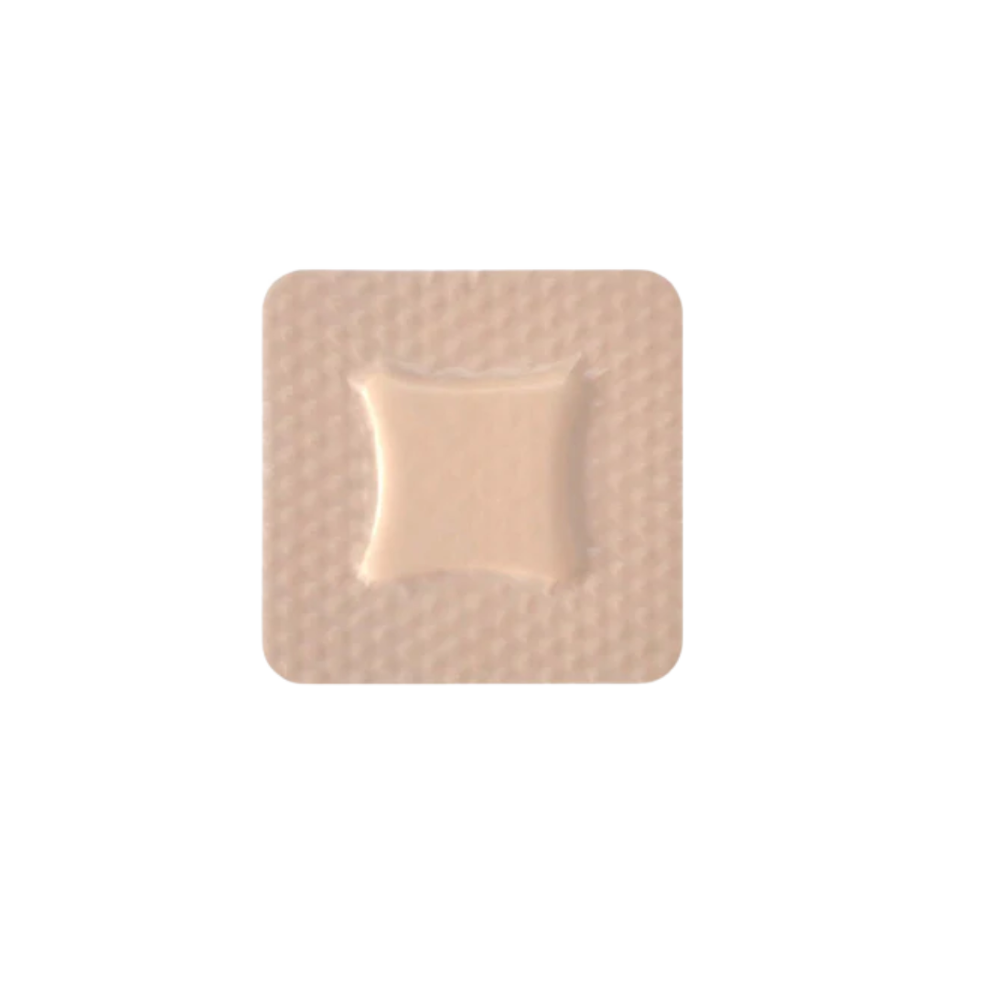 Close-up of a single 5cm x 5cm Osmocel Si Silicone Hydroporous Foam - Lite dressing with a bordered edge, showing its beige color and central absorbent pad.