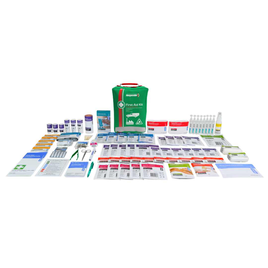 Responder 4 Softpack First Aid Kit case centered, surrounded by extensive contents laid out on a light background.