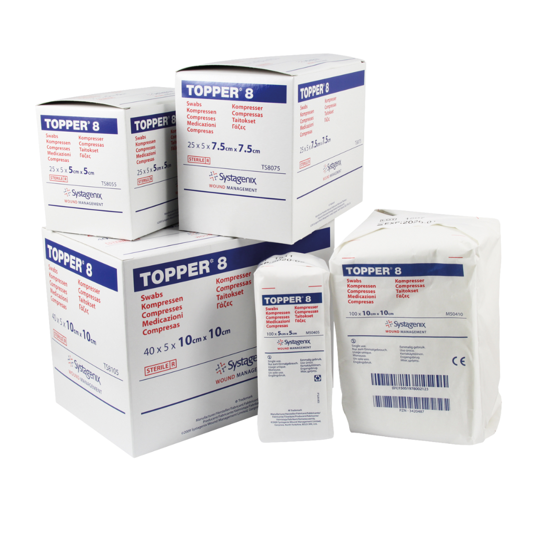 A group of various sized packages of Topper 8 non-woven gauze swabs/compresses from Systagenix Wound Management, including boxes and a soft pack.