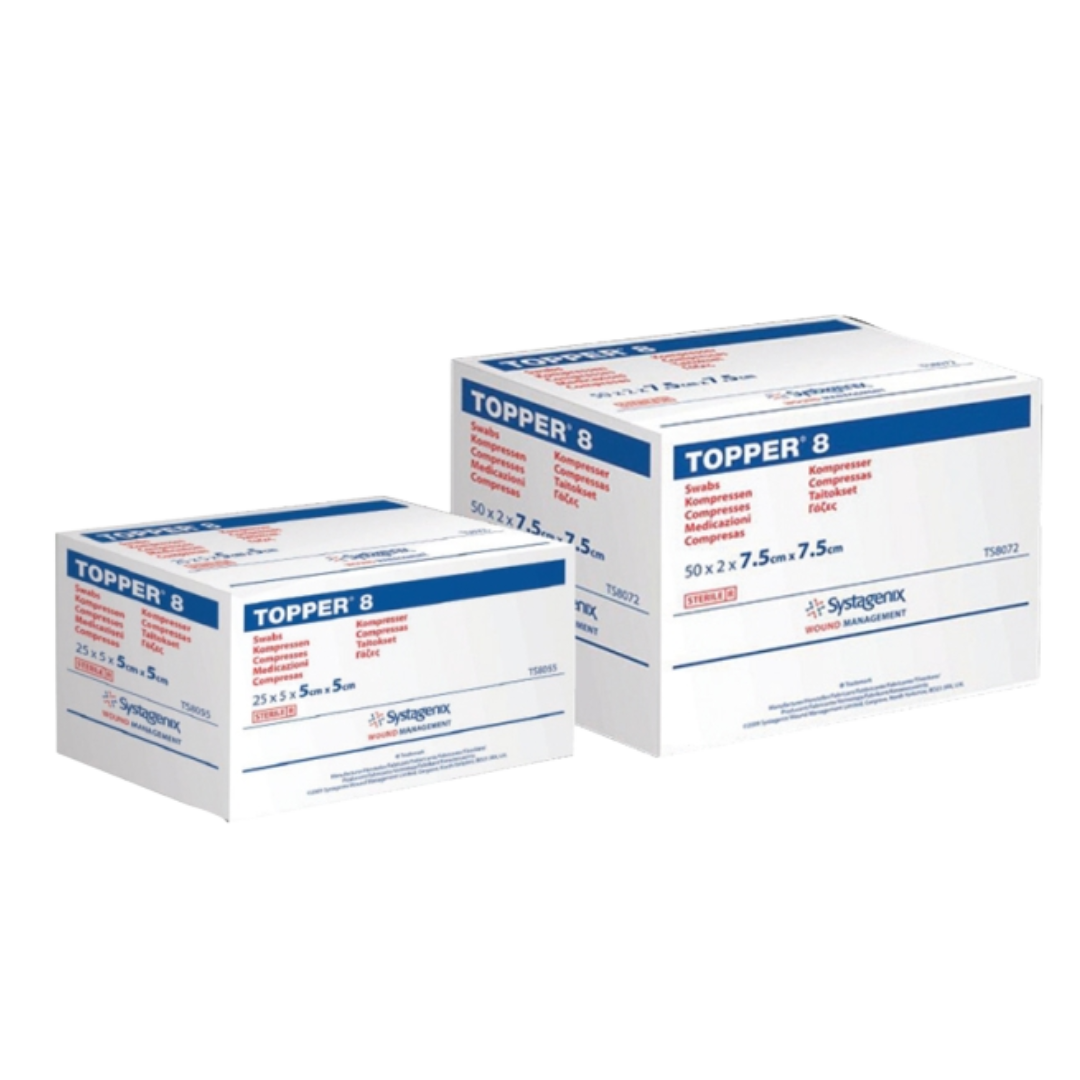 Two white and blue boxes of Topper 8 non-woven gauze compresses from Systagenix, showing the $5 \times 5 \text{cm}$ and $7.5 \times 7.5 \text{cm}$ sizes side-by-side.